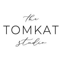 The TomKat Studio + TomKat Real Estate logo
