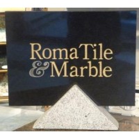 Roma Tile & Marble logo