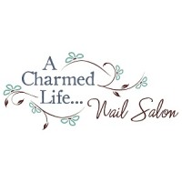A Charmed Life Nail Salon logo