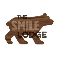 The Smile Lodge logo