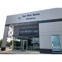 East West Marble Company logo