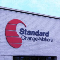 Standard Change-Makers - Div. Of RKU Standard Incorporated logo