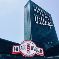 Village Barber And Shave Shop logo