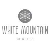 White Mountain Chalets logo