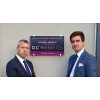 DC Motor Co logo