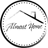 Almost Home General logo