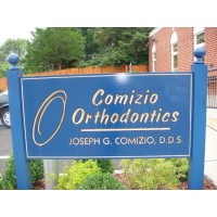 Comizio Orthodontics logo