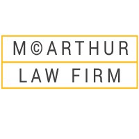 The McArthur Law Firm logo