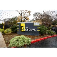 The Reserve Apartments logo