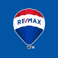 RE/MAX Preferred, Town & Country, and Properties logo