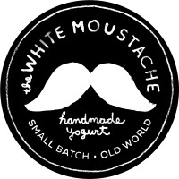 The White Moustache logo